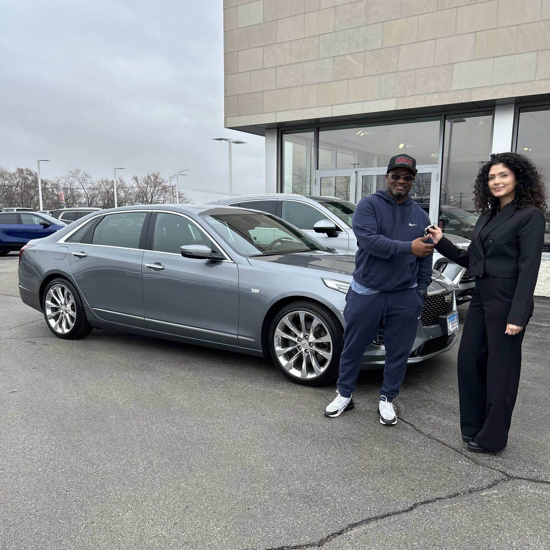 Customer taking delivery of his pre-owned CT6 he purchased with Eve Vega
